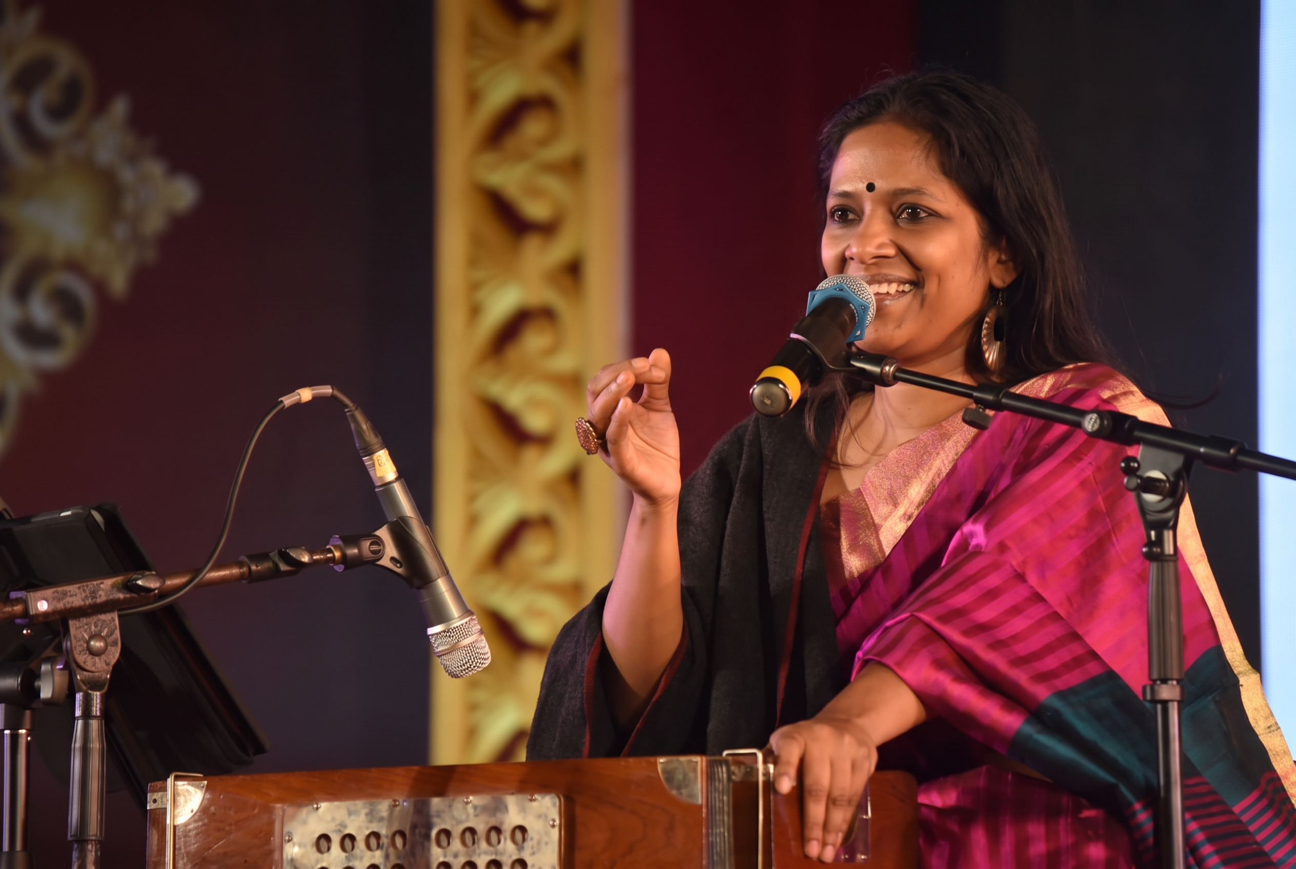 MD Pallavi performing with a harmonium